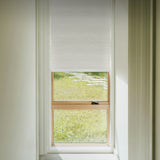 Moonlight White (Room Darkening) on Single Roller Automatic Shade